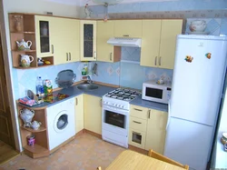 Corner kitchen design with refrigerator and washing machine