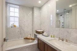 Bathroom in light marble photo