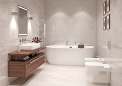 Light porcelain tiles in the bathroom interior photo