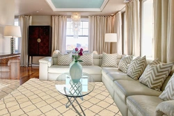 Carpet for a living room in a modern style with a corner sofa photo