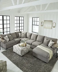 Carpet for a living room in a modern style with a corner sofa photo