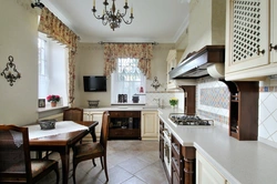 Kitchen design in a house with two windows photo