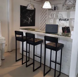 Bar counters in the interior of a kitchen in loft style