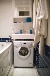 Bath design with a cabinet for a washing machine