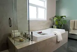 Интерьер фотосуретінде жасанды тастан жасалған ванналар