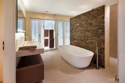 Bathtubs made of artificial stone in the interior photo