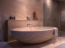 Bathtubs made of artificial stone in the interior photo