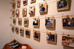 Place photos on the walls in the apartment