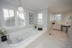 Gray walls and white floor in the bathroom photo