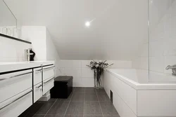 Gray walls and white floor in the bathroom photo