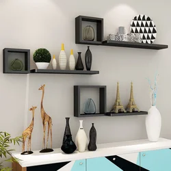 Decor on the shelves in the living room interior