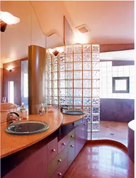 Bathtub with glass block partition photo