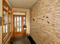 Plaster with stone in the hallway photo