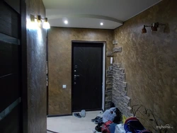 Plaster with stone in the hallway photo
