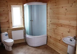 Bathroom in a wooden house photo with shower