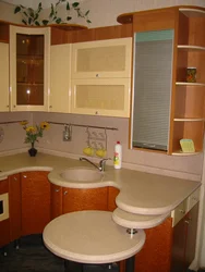 Small corner kitchen design with sink in the corner