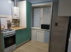Khrushchev kitchen design with a niche under the window