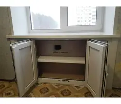 Khrushchev kitchen design with a niche under the window