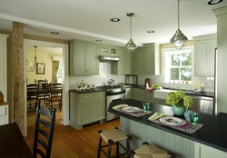 Combination Of Green Color In The Interior Of The Kitchen And Living Room