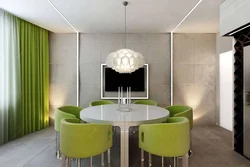 Combination of green color in the interior of the kitchen and living room
