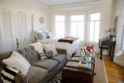Sofa as a sleeping place in the living room photo