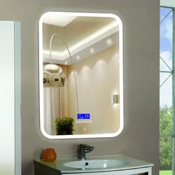 Bathtub with illuminated mirror photo