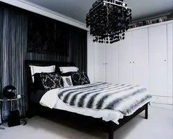 Bedroom design with black curtains