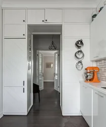 If the entrance door is in the kitchen photo