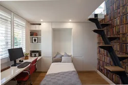 Photo of the room and bedroom and office all about one