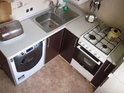 Design Of A Small Kitchen In Khrushchev With A Refrigerator And Washing Machine