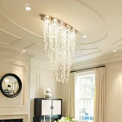 Chandeliers in the living room modern photos in the interior on a tension