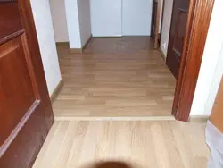 Laminate flooring in the apartment corridor photo