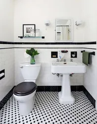 White bathtub with black floor photo