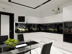 Kitchen with a black apron and countertop in a white interior