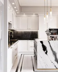 Kitchen with a black apron and countertop in a white interior