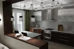 Living room kitchen with bar counter and sofa photo