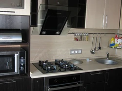 Kitchen with black appliances photo