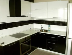 Photo of black kitchen top white