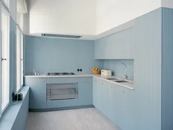 Blue kitchen with brown photo