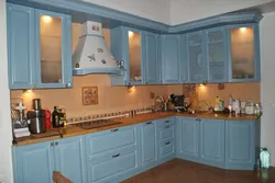 Blue kitchen with brown photo