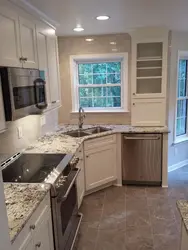 Square sink in the corner of the kitchen photo