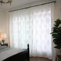 Fashionable tulle in the bedroom photo