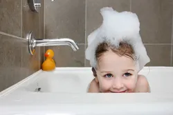 Baby photos in the bathroom