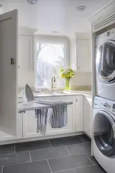 Dryer on washing machine in bathroom photo