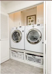 Dryer on washing machine in bathroom photo