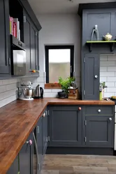 Gray kitchen design with wooden countertops