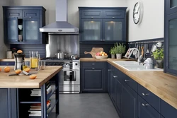 Gray kitchen design with wooden countertops