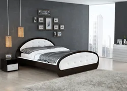 See photos of beds in the bedroom