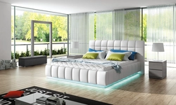 See photos of beds in the bedroom