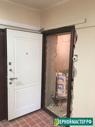 White Entrance Door To The Apartment Photo